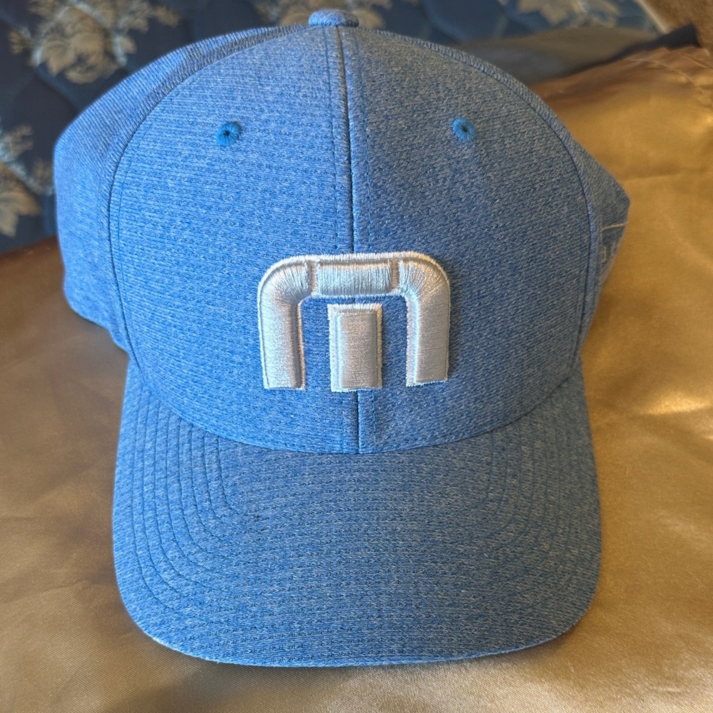 Travis Mathew Light Blue Flexfit Cap with White Logo Trim